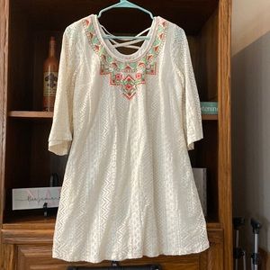 Medium white lace dress.